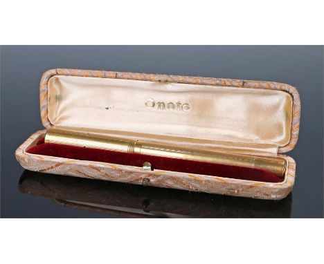 Onoto yellow metal fountain pen, the engine turned presentation case pen, housed within the Onoto case, the pen 14.5cm long