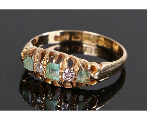 18 carat gold aquamarine and diamond set ring, set with three aquamarines and two diamonds, ring size M