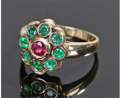 14 carat gold ruby and emerald ring, with a central ruby and emerald surround, ring size O