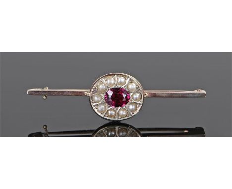 Pearl and tourmaline brooch, the central oval tourmaline with pearl surround to the bar brooch, 52mm long