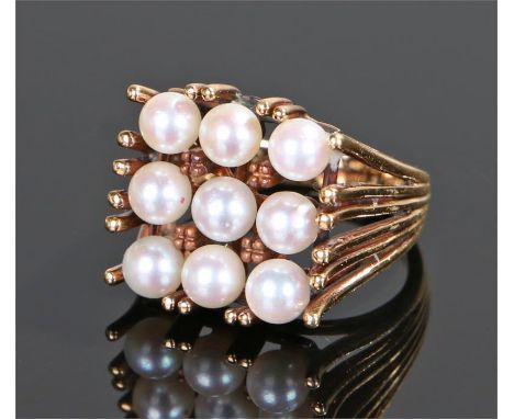 14 carat gold pearl set ring, set with nine pearls to the head, ring size M