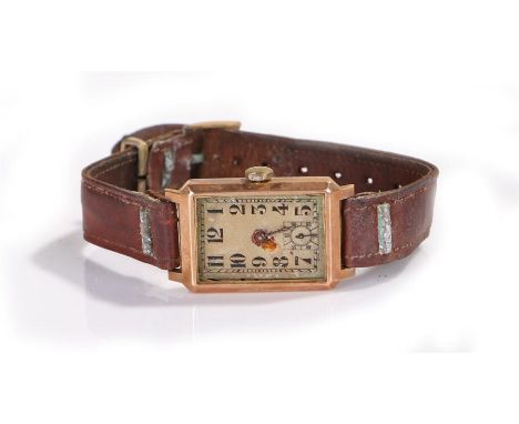 9 carat gold gentleman's wristwatch, the rectangular dial with Arabic hours and subsidiary seconds, manual wound, case 23mm d