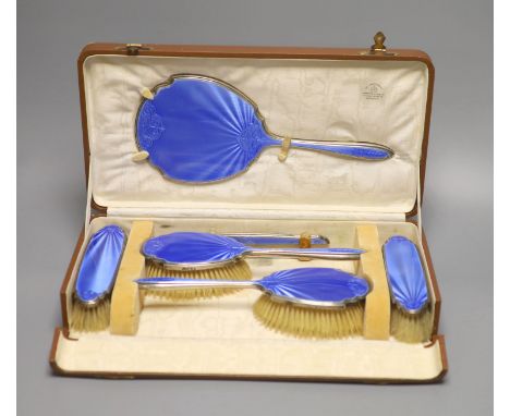 A cased George V silver and blue guilloche enamel six piece dressing set(a.f.) Mappin &amp; Webb, Birmingham, 1929.