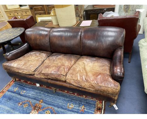 A George Smith Howard style brown leather three seater sofa, length 210cm, depth 106cm, height 84cm