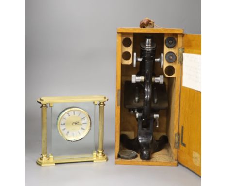 An oak-cased black japanned microscope, case 35cm high, width 16cm, 20cm depth and a brass mantel timepiece