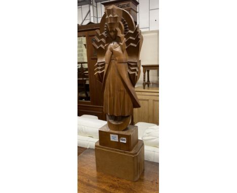 A wooden figure of the Virgin Mary in Art Deco style, on stand width 23cm, depth 14cm, height 78cm