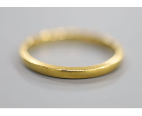 A 22ct gold wedding ring, size J/K, 1.9 grams.