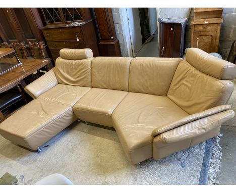 An Italian beige leather curved corner sofa, length 250cm, maximum width 160cm, height 90cm