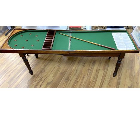 An early Victorian mahogany bagatelle table, width 120cm, depth 64cm, height 90cm
