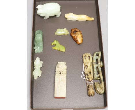 Six Chinese jade and hardstone animal carvings, two 'dragon' belt hooks, a ram's head and a soapstone seal, 10cm