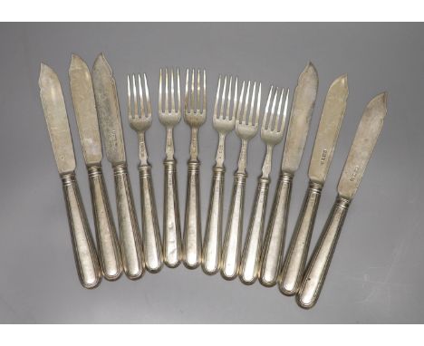 A set of six pairs of George V silver fish eaters, George Howson, Sheffield, 1919/1920, knife 21.4cm, loaded handles.