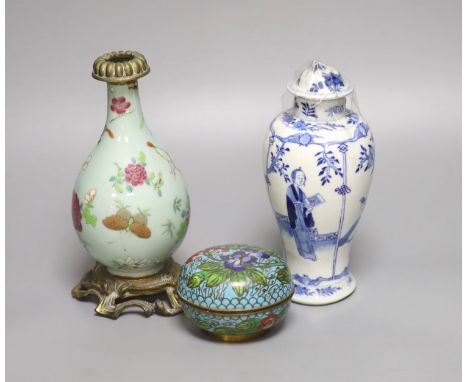 A 19th century Chinese famille rose and ormolu mounted vase, a blue and white vase and a cloisonne enamel box and cover, tall