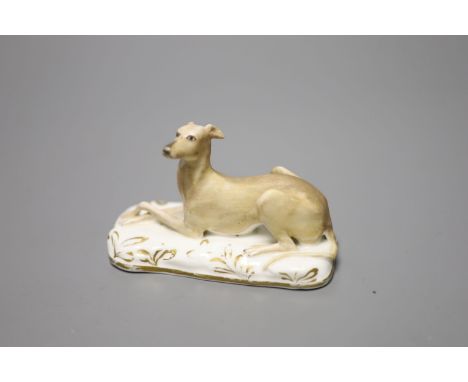 A Grainger, Lee &amp; Co., Worcester porcelain greyhound, cushion base, c.1830, width 10cmCONDITION: ex Dennis G. Rice collec