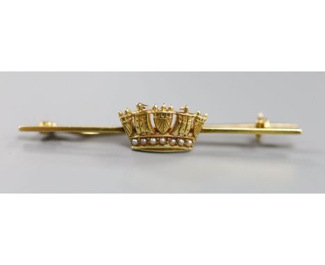 An Edwardian 15ct, enamel and seed pearl set coronet bar brooch, 46mm, gross 2.7 grams.