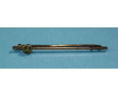 9ct Gold Stick Pin Set With a Small Peridot Coloured Stone