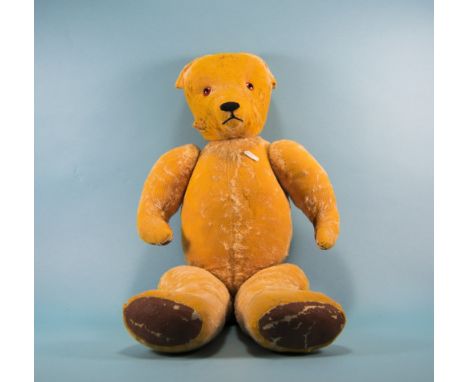 Vintage Well Loved Distressed Large Teddy Bear with jointed arms and legs, with a pointed nose. 24 inches in length.