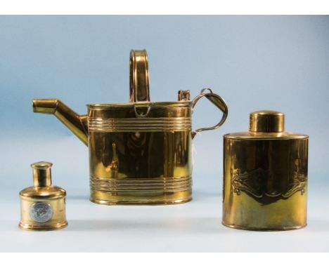 A Vintage Brass Watering Can and Two Lidded Canisters Watering Can. Size 10 Inches High. All Pieces are In Good Condition. 