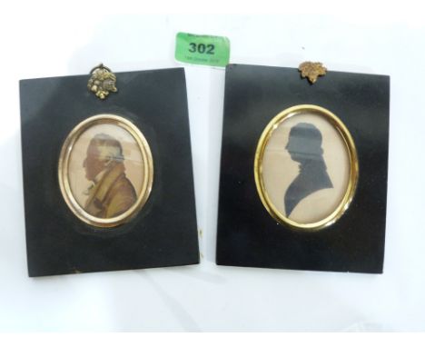 A Regency portrait miniature silhouette in ebonised frame and a similarly framed portrait miniature of a gentleman in profile