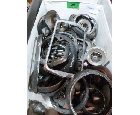 A box of lamp bezels, bulb holders and lamp parts