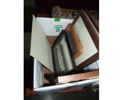 A box of pictures to include a small watercolour of a cardinal, a Baxter print of Nelson and a Victorian needlework sampler