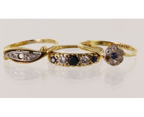 Three yellow gold (tests 18ct) vintage rings, stones include diamonds, sapphire and CZ,  finger size J/K L and M/N, all with 