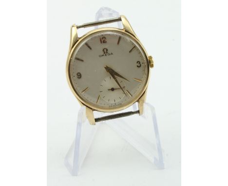 Gents 9ct gold cased Omega manual wind wristwatch, circa 1961. The champagne dial with Arabic numerals at quarters the remain