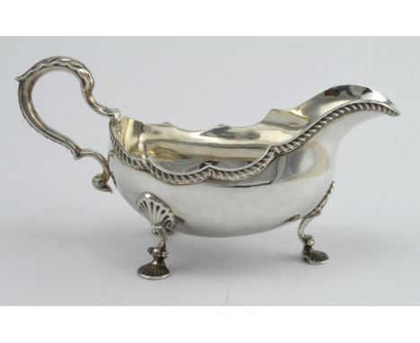 Large silver sauce boat on three splay feet, very attractive and good gauge of silver, hallmarked AC&amp;SS Ltd. London 1973.