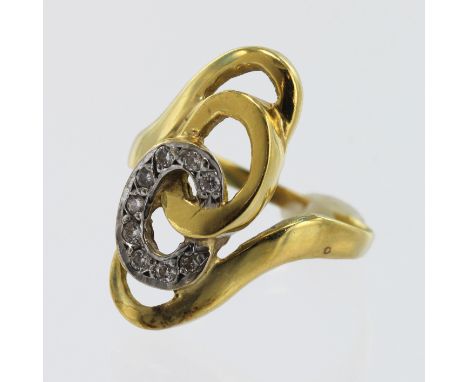 Yellow gold (tests 18ct) abstract dress ring, set with CZ's highlighted in white gold, head measures 25mm x 10mm, finger size