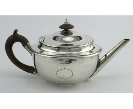 George III silver teapot, hallmarked HN (Hannah Northcote) London 1802. Repair to one side and repair to wooden handle, lid i