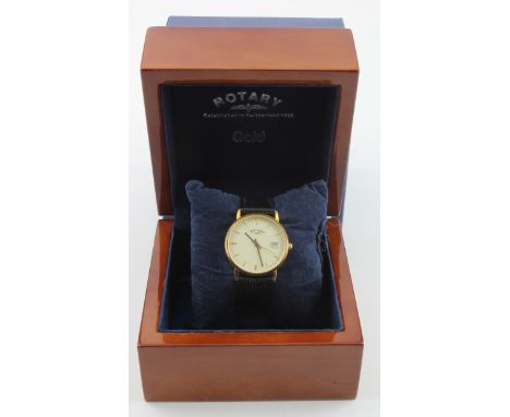Rotary 18ct yellow gold cased modern gents quartz wristwatch. The cream dial with baton hour markers and date aperture at 3 o