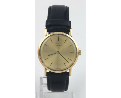 Gents 9ct gold cased 1974 Longines manual wind wristwatch. The gilt dial with black baton hour markers and hands, on a leathe