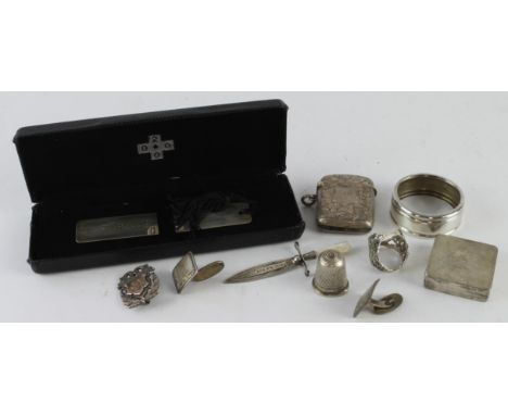 Assortment of silver, including a Victorian vesta case, antique tag of war medal brooch, vintage Mother of pearl set dagger b