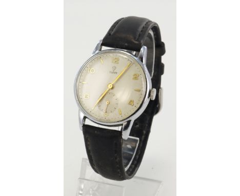 Gents stainless steel cased Tudor manual wind wristwatch. The cream dial with alternating gilt Arabic numerals and arrow mark