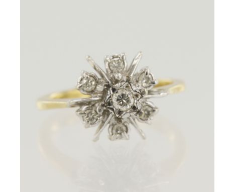 Yellow gold (tests 18ct) diamond cluster ring, seven round brilliant cut diamonds, TDW approx. 0.20ct, head diameter 10mm, fi