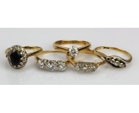 Five yellow gold (tests 18ct) rings, stones include diamond and sapphire, finger sizes K/Lx4, L/M, all with some damage, tota