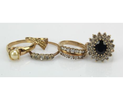 Five 9ct gold/tests 9ct rings, stones include sapphire, cultured pearl and CZ, finger sizes G/H, P x3, V, total weight 15.4g.