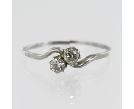 Tests platinum diamond Toi Et Moi ring, two cut diamonds, TDW approx. 0.29ct, cross over claw setting, finger size Q/R, weigh
