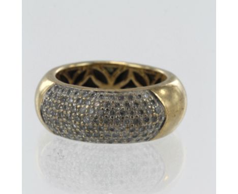 Yellow gold (tests 9ct) diamond domed pave set ring, seven rows of melee diamonds, TDW approx. 1ct, head width 9mm, finger si