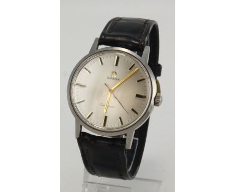 Gents stainless steel cased Omega Geneve manual wind wristwatch, 1962. The silver dial with baton markers, black outer minute