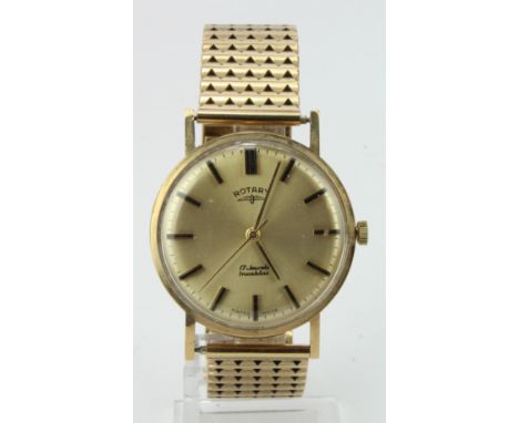 Gents 9ct cased Rotary manual wind wristwatch, hallmarked London 1973. The gilt dial with gilt baton markers. Case diameter 3