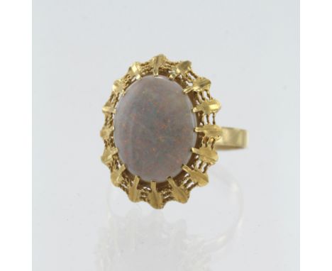 Yellow gold (tests 18ct) opal cocktail ring, opal measures 14mm x 11mm, finger size R, weight 3.9g.