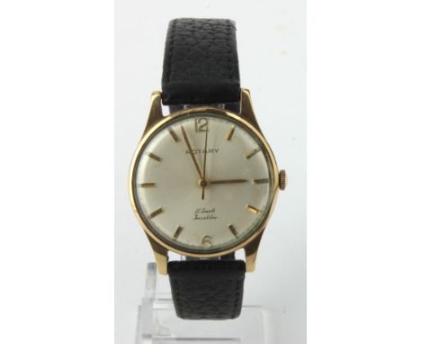 Gents 9ct cased Rotary manual wind wristwatch, hallmarked 1961. The cream dial with gilt baton markers. Watch working when ca