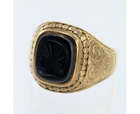 9ct yellow gold hematite college style ring, set with a hematite intaglio measuring 11.5mm x 9mm, finger size R, weight 8.4g.