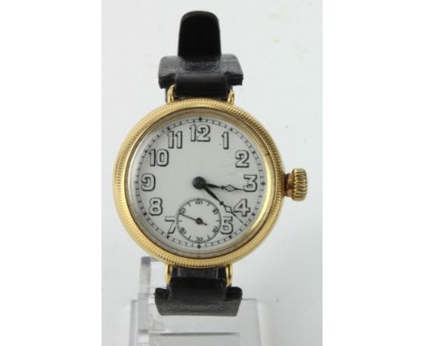Gents 18ct cased wristwatch in a Dennison case, hallmarked Birmingham 1919. The white dial with arabic numerals, subsidiary s