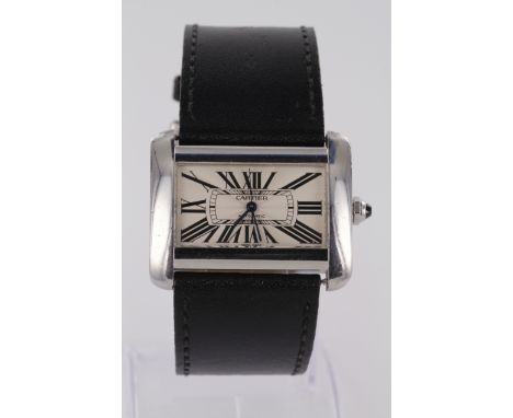 Gents stainless steel cased Cartier automatic wristwatch (ref 2612). The engine turned cream dial with black roman numerals (