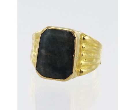 Yellow gold (tests 22ct) bloodstone signet ring, bloodstone measures 14mm x 10mm, finger size S, weight 8.4g.