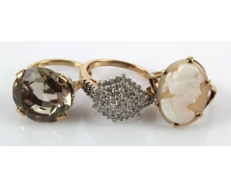 Three 9ct gold/tests 9ct rings, stones include diamonds, citrine, carved shell cameo, finger sizes J/K, L/M, R, total weight 