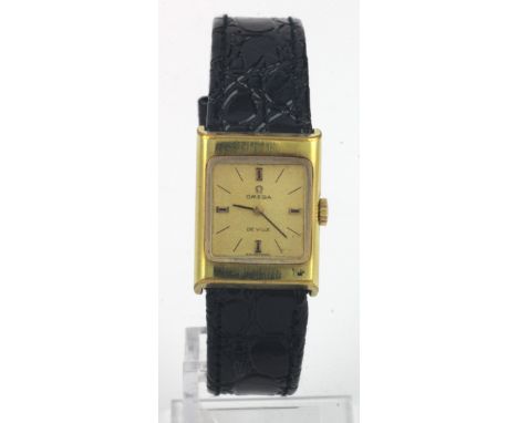 Ladies gold plated Omega De Ville manual wind wristwatch, circa 1970, The gilt square dial with gilt baton markers. Case size