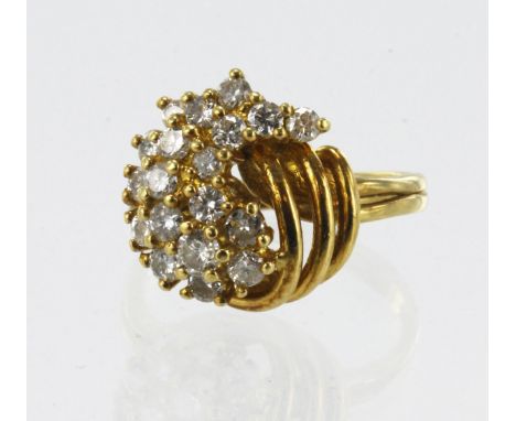 Yellow gold (tests 18ct) diamond cluster ring, nineteen round brilliant cuts TDW approx. 0.58ct, head measures 14mm x 14mm, f