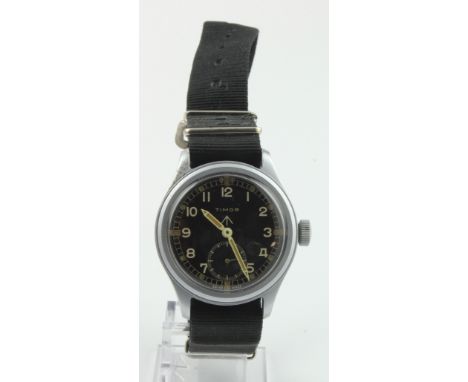 Timor British military issue 'Dirty Dozen' wristwatch. The black dial with white Arabic numerals, broad arrow below 12, white